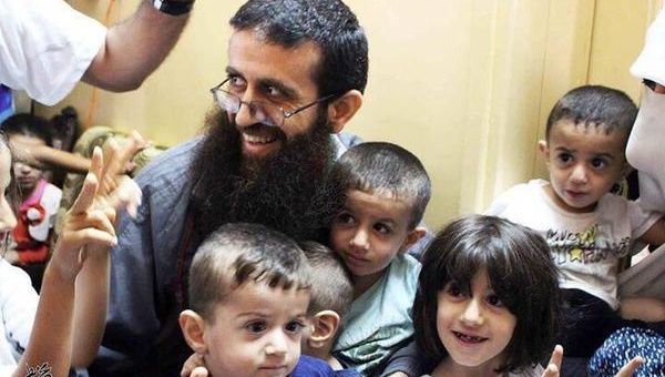 Palestinian Khader Adnan with friends and family following his release Sunday from Israeli detention. 