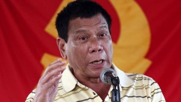 President Rodrigo Duterte, then a candidate, speaks in front of a communist rebel group New People