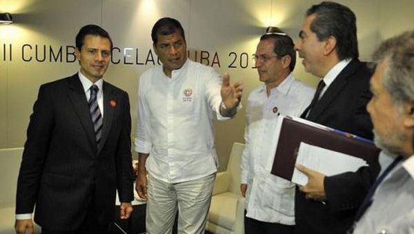 Ambos presidentes sostuvieron un breve encuentro en la pasada Cumbre de la CELAC (Foto: Andes)