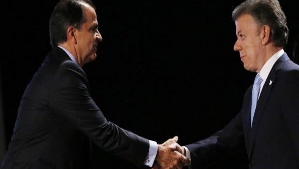 Los candidatos Juan Manuel Santos y Óscar Iván Zuluaga buscan ganar la presidencia de Colombia el próximo 15 de junio. (Foto: Archivo)