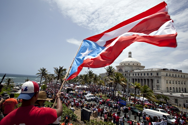 El incumplimiento de pago de Puerto Rico está bien, mientras paguen la deuda a Wall Street