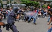 Las autoridades policiales utilizaron gases lacrimógenos y balas de goma contra los brasileños que protestaron contra las políticas de Jair Bolsonaro.