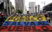 Colombianos se movilizan en la capital colombiana contra la agenda neoliberal del presidente Iván Duque. 